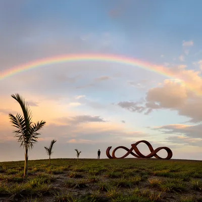 Rainbow After Rain Over Hopeful Landscape
