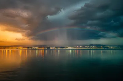 Rainbow After Rain Over Calm Bay