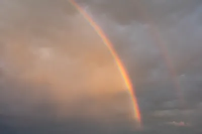 Rainbow After Rain in Beautiful Sky