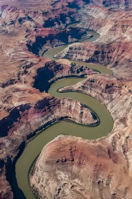 Aerial River Winding Through Desert Canyon