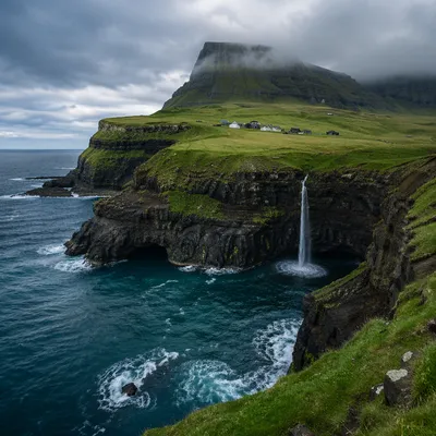 Dramatic Basalt Cliffs and Ocean Waterfall