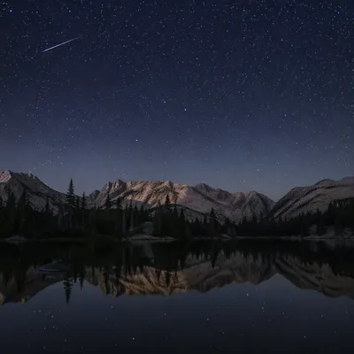 Starry Night Over Alpine Lake Reflection