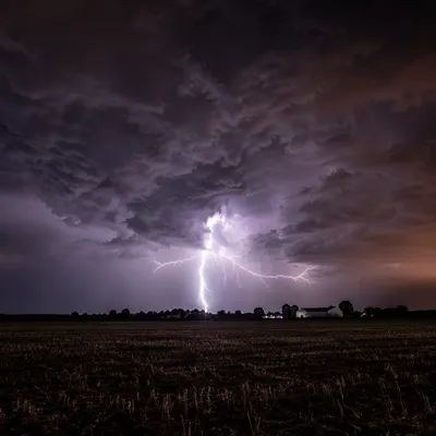 Dramatic Night Thunderstorm Over Rural Field