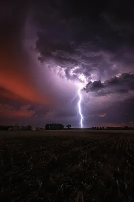 Dramatic Night Thunderstorm Over Rural Field