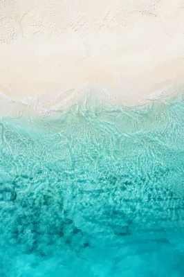 Secluded Tropical Beach Aerial Shoreline View