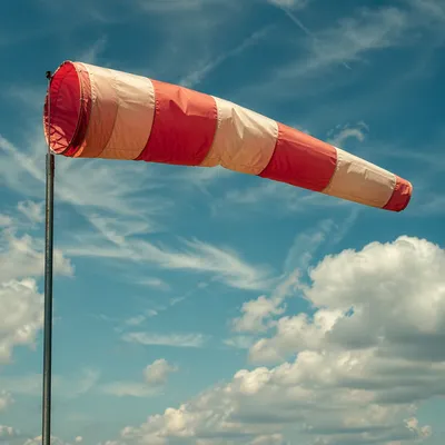Red Windsock Under Blue Sky