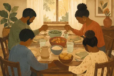 African American Family Prayer at Dinner Table