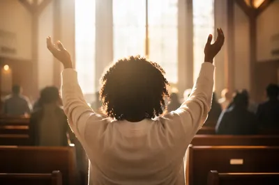 Woman with Raised Hands in Sanctuary
