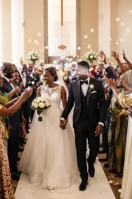 African Wedding Couple Walking Down Church Aisle