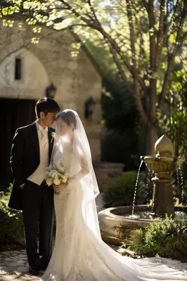 Asian Couple Wedding Portrait in Chapel Garden