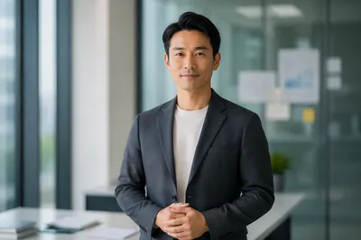 Confident Asian Man in Modern Office