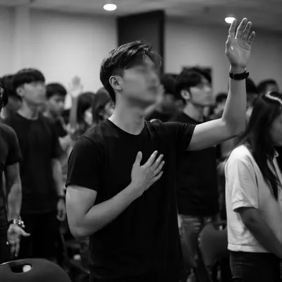 Young Adult Worshipper in Monochrome Hall