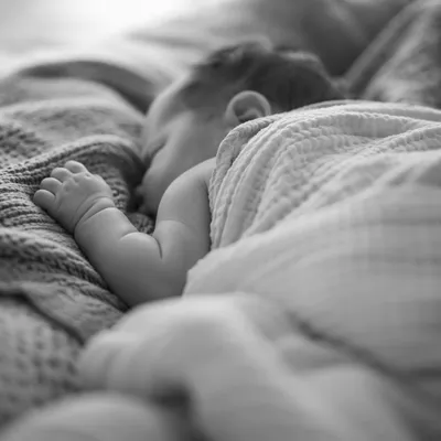 Peaceful Sleeping Newborn on Soft Blanket