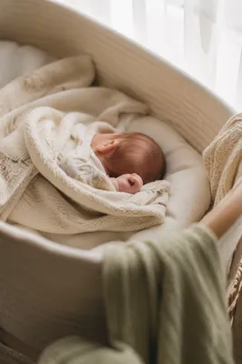 Peaceful Newborn Sleeping in Soft Blanket