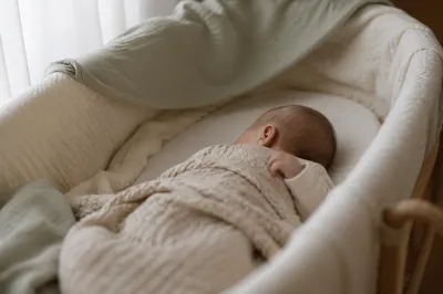 Peaceful Newborn Sleeping in Soft Blanket