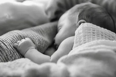 Peaceful Sleeping Newborn on Soft Blanket