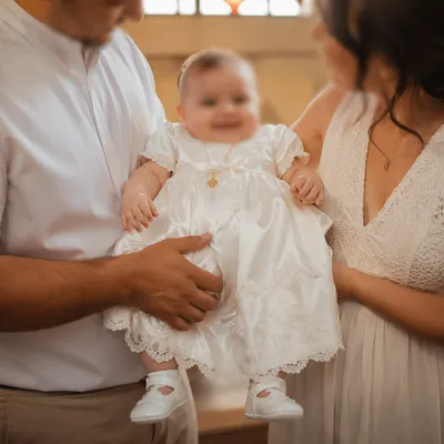 Joyful Baptized Child with Family Celebration