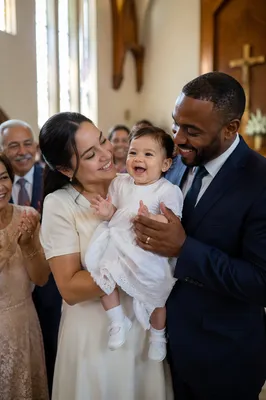 Smiling Toddler After Baptism With Family