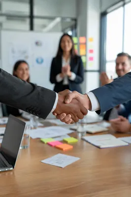 Professional Handshake in Modern Business Meeting