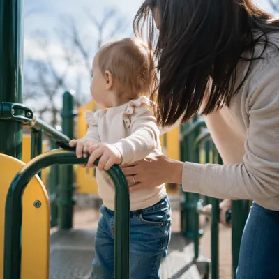 Happy Toddler Playing at Sunny Park