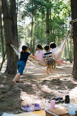 Happy Children Playing on Park Hammock