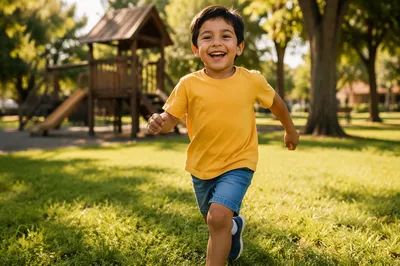 Happy Boy Running in Sunny Park