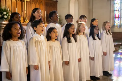 Children Choir Singing in White Robes