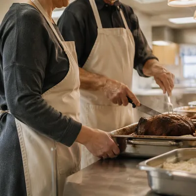Church Volunteers Serving Meal in Kitchen
