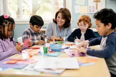 Children Doing Crafts in Bright Classroom