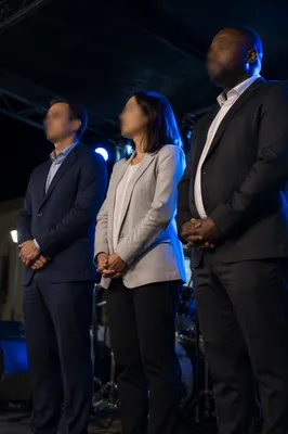 Multicultural Professionals Standing Together at Night Event