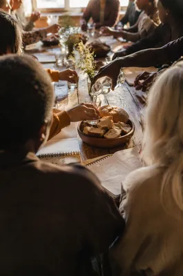 Multicultural Fellowship Around a Rustic Table