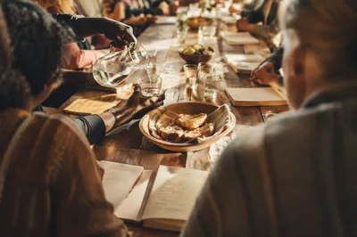 Multicultural Fellowship Around a Rustic Table