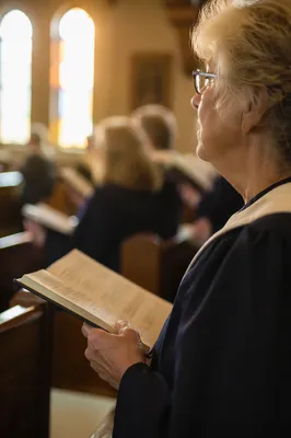 Elderly Choir Member Singing Sunday Hymn