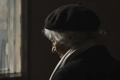 Dignified Elderly Silhouette with Gentle Smile