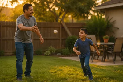 Father and Son Playing Catch Backyard