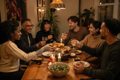 Friends Laughing Around Cozy Dinner Table