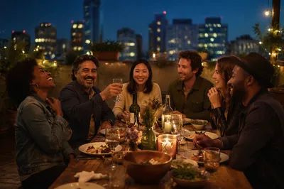 Friends Laughing at Rooftop Dinner Party