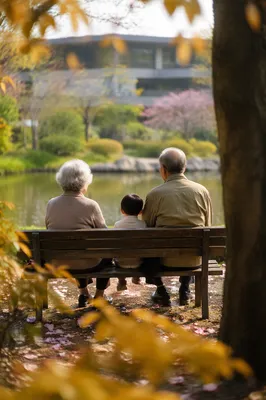 Grandparents and Grandchild by Garden Pond