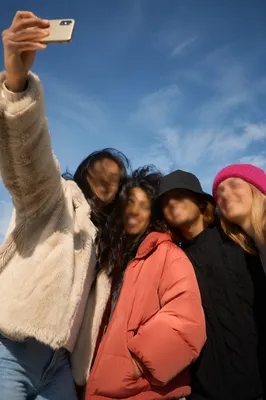 Joyful Outdoor Friends Selfie Under Blue Sky