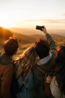 Joyful Friends Taking Outdoor Selfie at Sunset