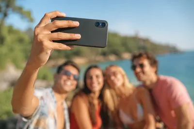 Friends Taking Sunny Outdoor Selfie