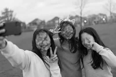 Playful Friends Outdoor Selfie Moment