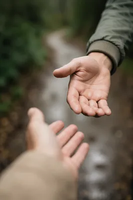 Helping Hand Reaching on Rainy Path