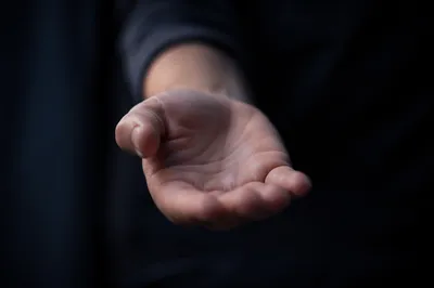 Outstretched Hand Reaching for Connection
