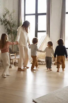 Joyful Family Together in Bright Living Room