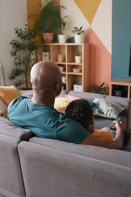 Happy Family Movie Time in Cozy Living Room