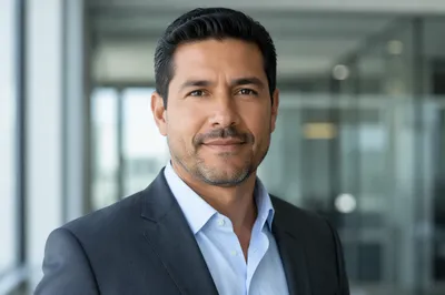 Confident Hispanic Businessman Office Headshot