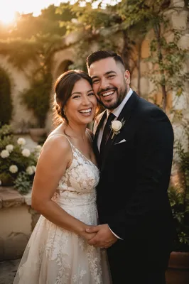 Joyful Hispanic Wedding Couple in Garden