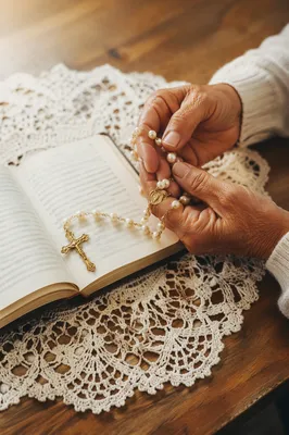 Hispanic Grandmother Hands Holding Rosary in Prayer