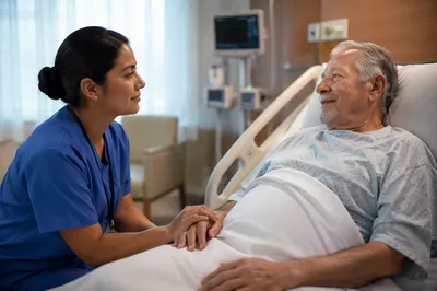 Compassionate Nurse Holding Elderly Patient Hand